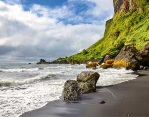 Schwarze Sandstrände bei Vík í Mýrdal in Island